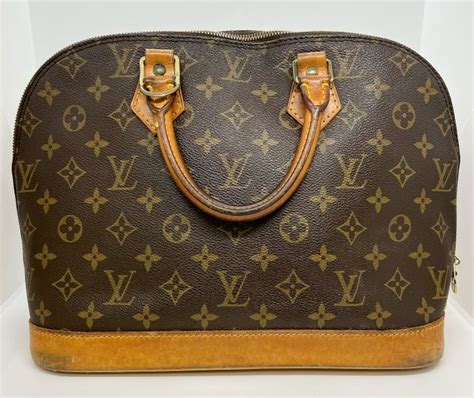 borsa louis vuitton pelle senza codice|Scopri come distinguere tra una Louis Vuitton falsa e originale: .